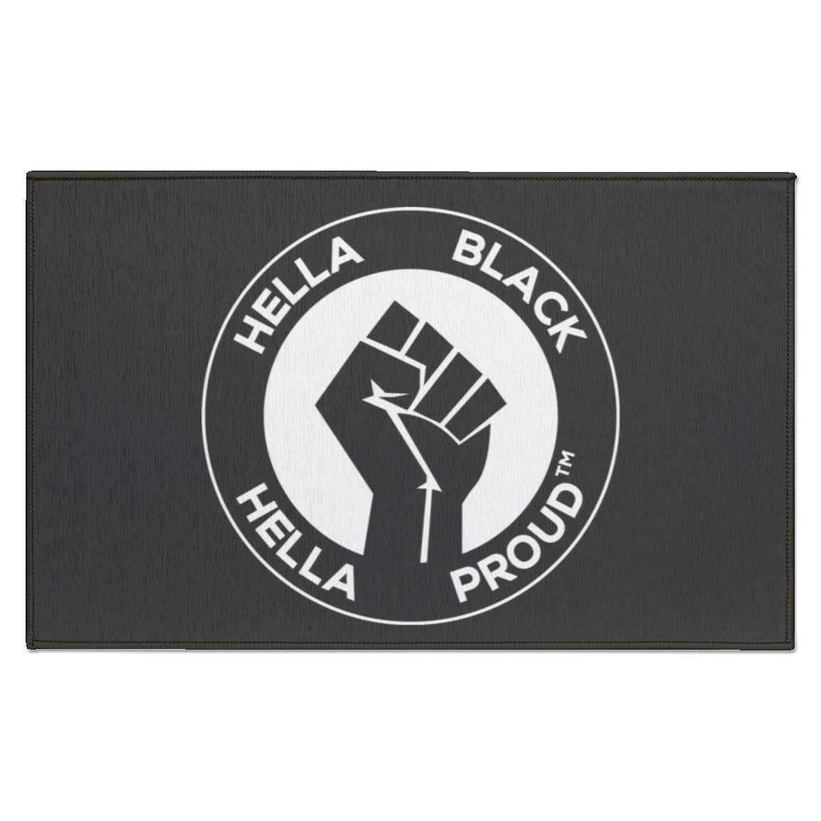 Indoor door mat with our "Hella Black Hella Proud" logo printed in the center.